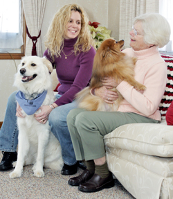 Hazel Levan of Boyertown holds her dog Mia while her daughter Joan Comtois holds her dog Brinkley
